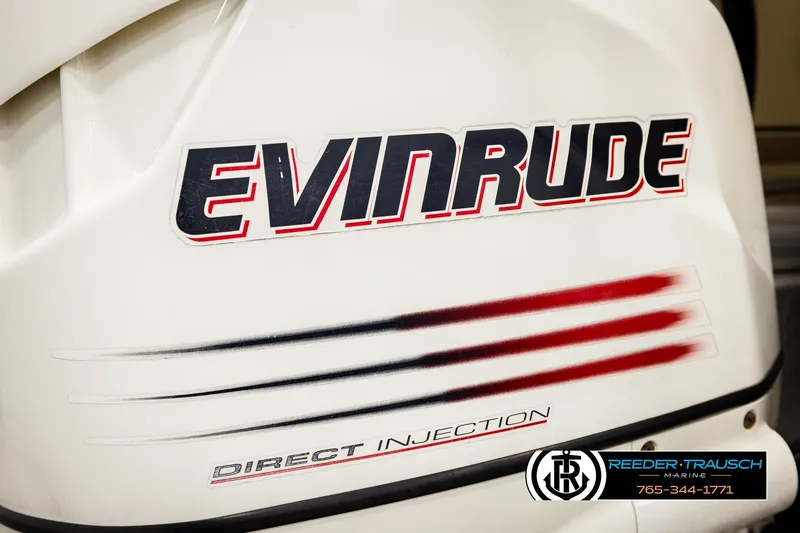 Slide: The Image of Evinrude outboard motor with direct injection, featuring Reeder-Trausch Marine branding. - 44