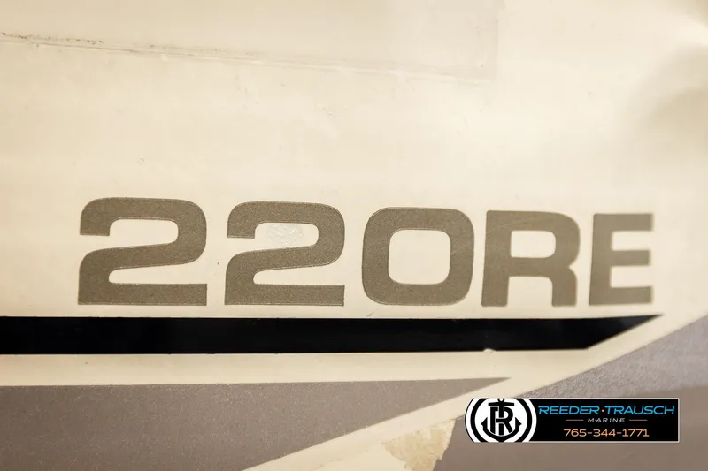 Slide: The Image of Close-up of 2004 AquaPatio 220 RE boat model lettering and logo. - 49