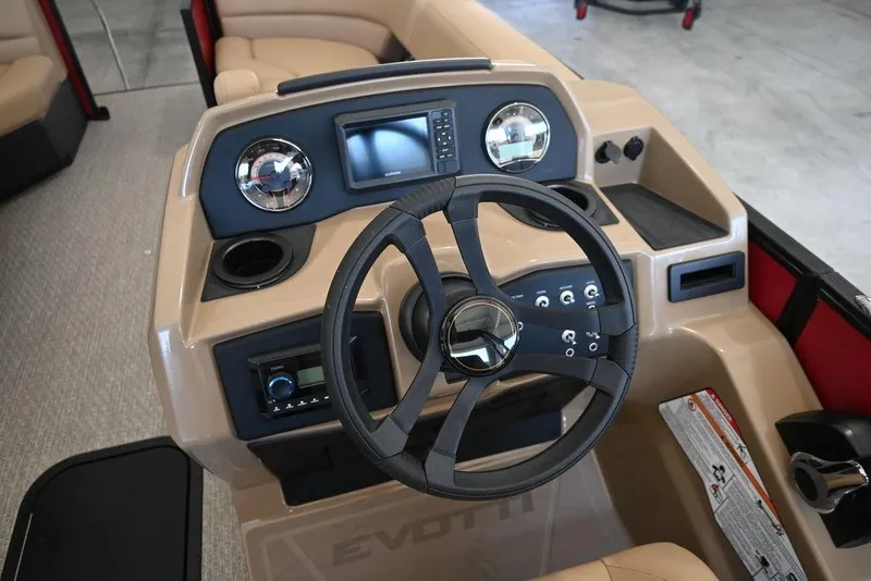Slide: The Image of 2026 Evotti 521CS boat dashboard with steering wheel and control panel. - 10