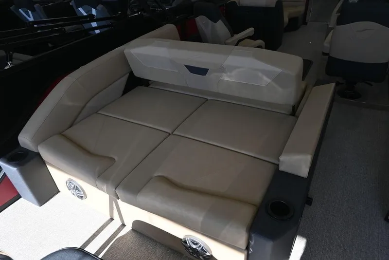 Slide: The Image of Luxurious seating in 2026 Evotti 521CS boat with beige upholstery and integrated speakers. - 12