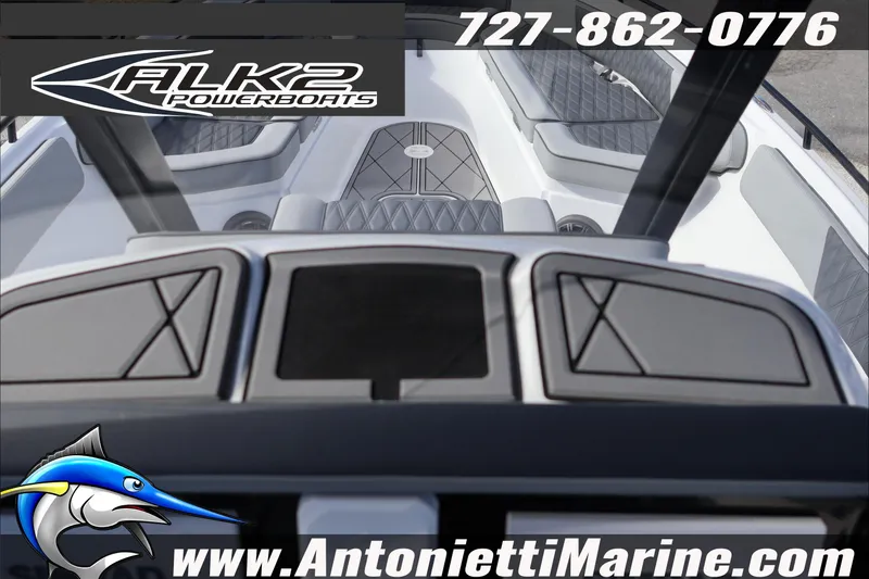 Slide: The Image of 2026 ALK2 Powerboats 25 CRXL interior with sleek design and luxury seating. - 12
