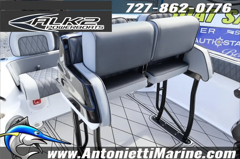 Slide: The Image of 2026 ALK2 Powerboats 25 CRXL interior with sleek seating and modern design. - 16