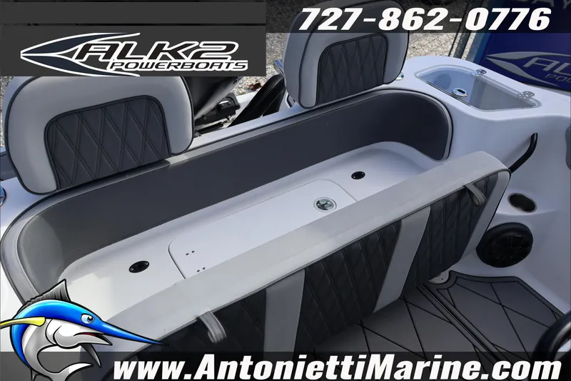 Slide: The Image of 2026 ALK2 Powerboats 25 CRXL interior seating with logo and contact details. - 19
