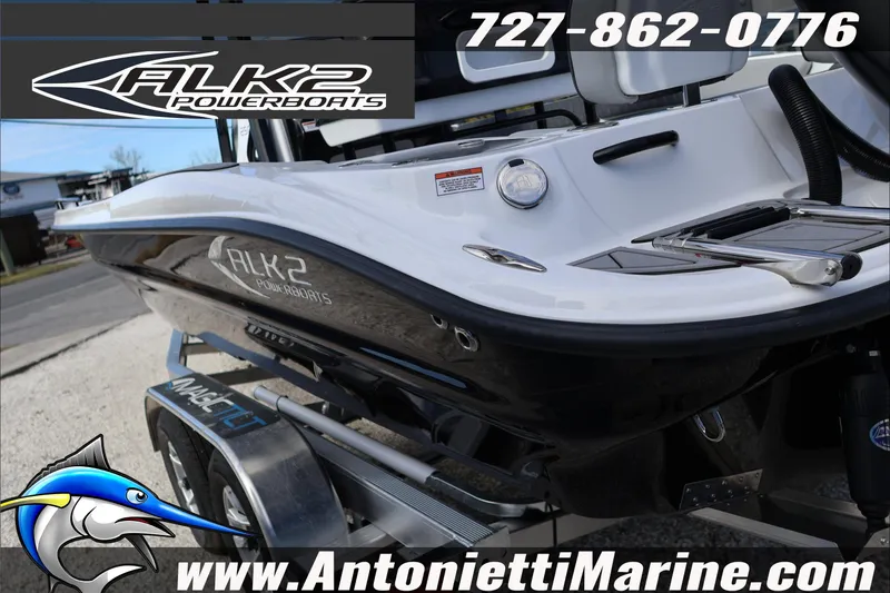 Slide: The Image of 2026 ALK2 Powerboats 25 CRXL on trailer, featuring sleek design and branding details. - 6