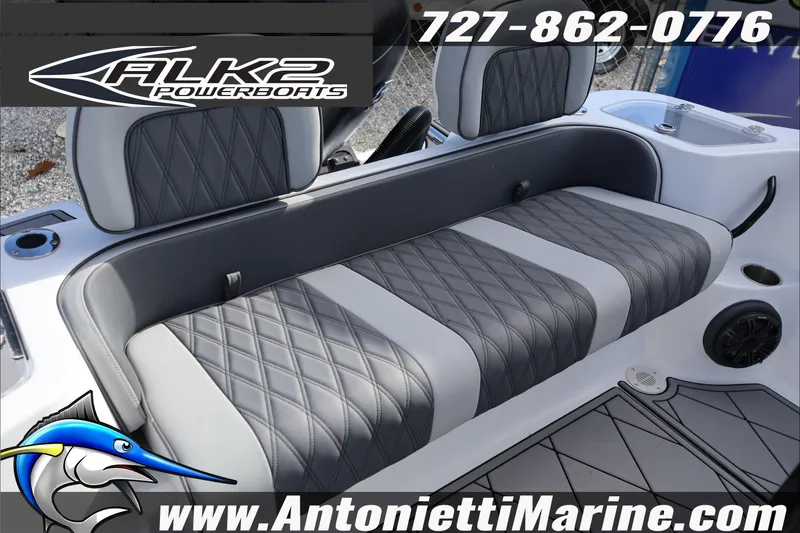 Slide: The Image of 2026 ALK2 Powerboats 25 CRXL interior seating with diamond-stitched upholstery. - 7
