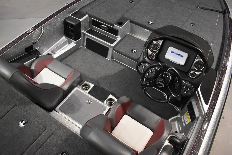 Slide: The Image of 2026 Triton 18 TrX boat interior with modern dashboard and seating. - 17