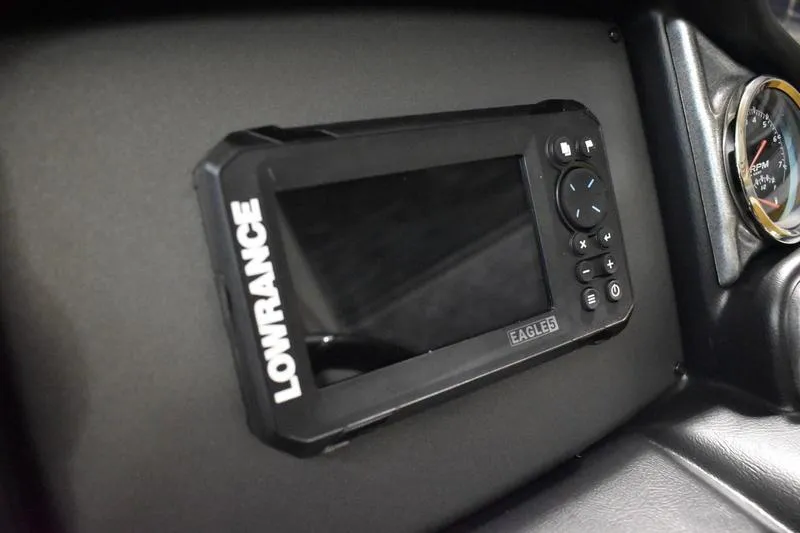 Slide: The Image of Lowrance display on 2026 Triton 18 TrX dashboard, featuring navigation controls. - 19