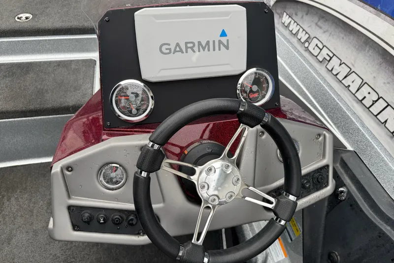 Slide: The Image of 2017 Ranger Z175 boat dashboard with Garmin display and steering wheel. - 11