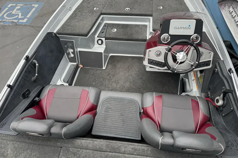 Slide: The Image of 2017 Ranger Z175 boat interior with Garmin navigation, dual seats, and steering console. - 19