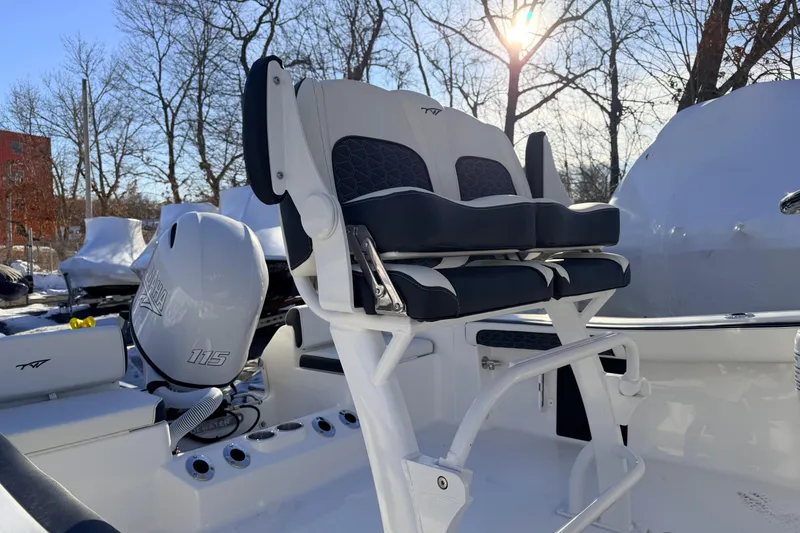 Slide: The Image of 2026 Tidewater 198 CC Adventure boat with Yamaha 115 engine, outdoor setting. - 9