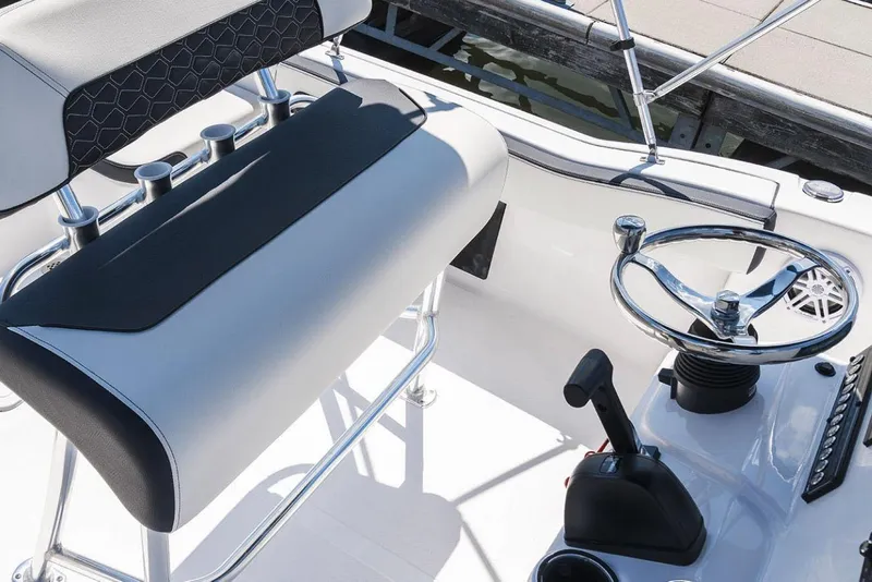 Slide: The Image of Manufacturer Provided Image: 2026 Tidewater 180 CC Adventure boat dashboard with steering wheel and navigation system. - 3