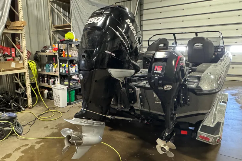 Slide: The Image of 2018 Nitro ZV21 boat with Mercury Verado 350 engine in a garage setting. - 6