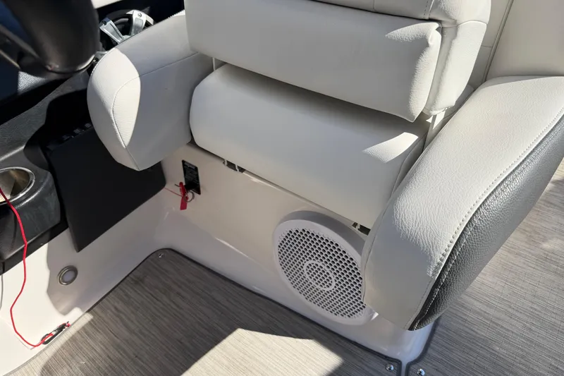 Slide: The Image of 2017 Regal 2700 ES Bowrider interior with cushioned seating and speaker system. - 20
