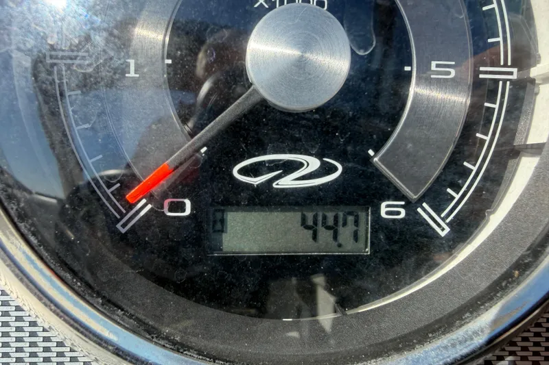 Slide: The Image of Close-up of a 2017 Regal 2700 ES Bowrider tachometer displaying 447 hours. - 22
