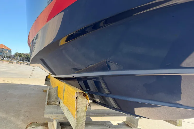 Slide: The Image of 2017 Regal 2700 ES Bowrider with hull damage on trailer. - 31