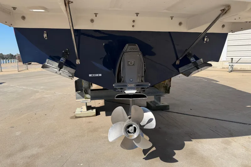 Slide: The Image of Rear view of 2017 Regal 2700 ES Bowrider with Volvo Penta outdrive. - 7