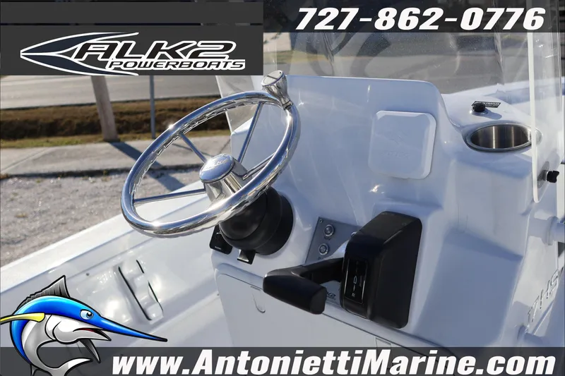 Slide: The Image of Steering console of 2026 ALK2 Powerboats 17HS, featuring sleek design and controls. - 7
