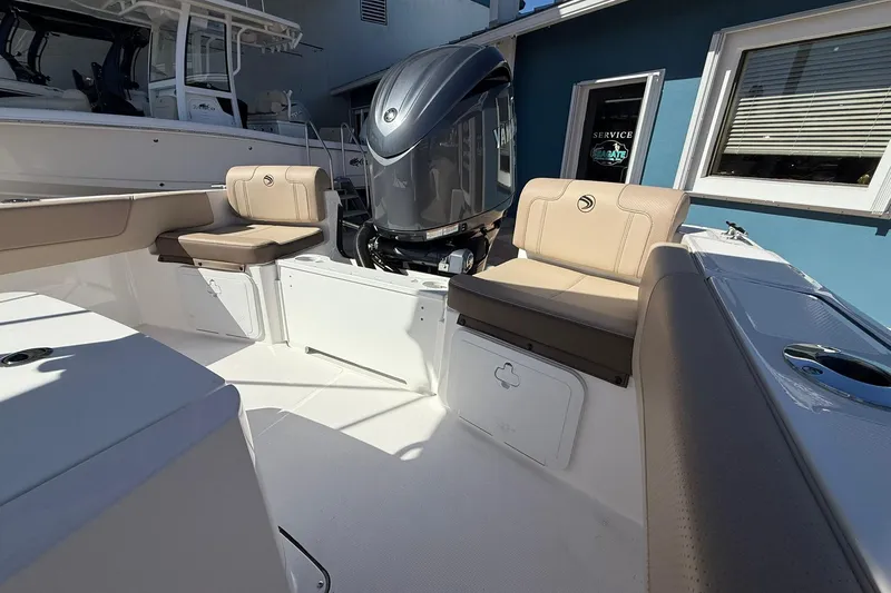 Slide: The Image of 2026 Edgewater 188CC boat interior with seating and Yamaha engine. - 3