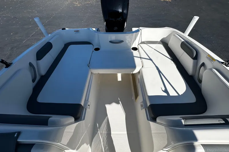 Slide: The Image of 2021 Bayliner Element E18 boat interior with spacious seating and sleek design. - 5