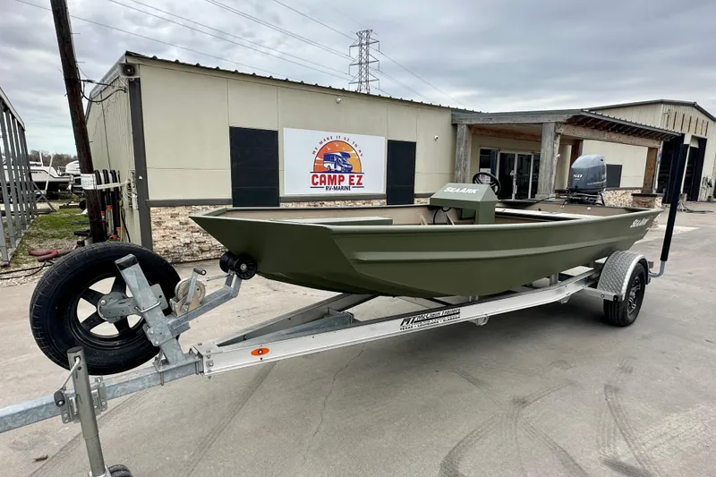 The Image of 2026 SeaArk 1652 Special boat on trailer outside Camp EZ RV-Marine building. - 1