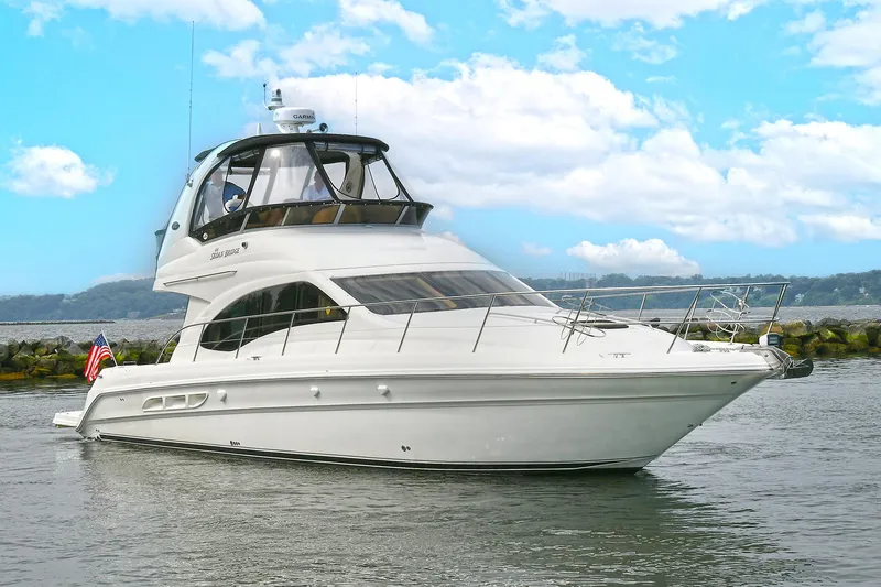 The Image of 2008 Sea Ray 44 Sedan Bridge on calm waters. - 0
