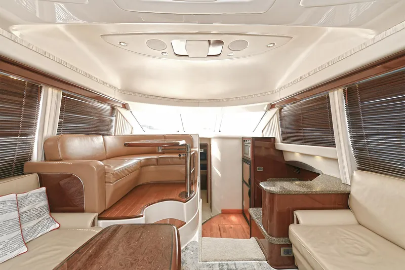 Slide: The Image of Interior of a 2008 Sea Ray 44 Sedan Bridge yacht, luxurious and modern. - 21