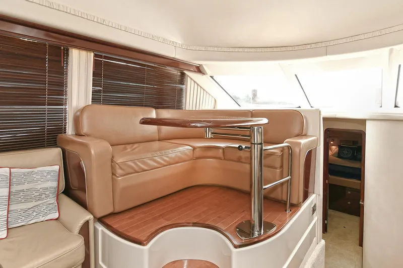 Slide: The Image of Interior of 2008 Sea Ray 44 Sedan Bridge with leather seating. - 24
