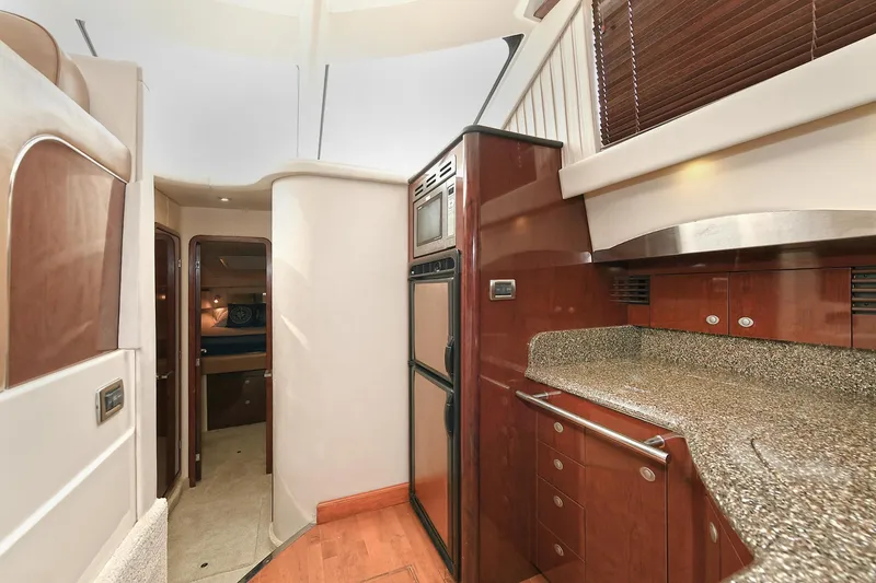 Slide: The Image of Interior of 2008 Sea Ray 44 Sedan Bridge with modern kitchen. - 31