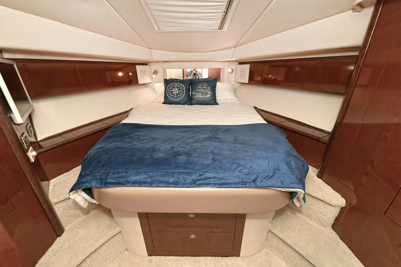 Slide: The Image of Luxurious bedroom in a 2008 Sea Ray 44 Sedan Bridge yacht. - 32
