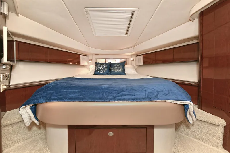 Slide: The Image of Luxurious bedroom in a 2008 Sea Ray 44 Sedan Bridge yacht. - 33