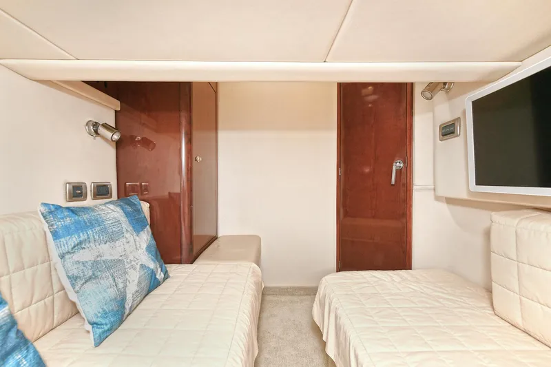 Slide: The Image of Interior of 2008 Sea Ray 44 Sedan Bridge with twin beds. - 41