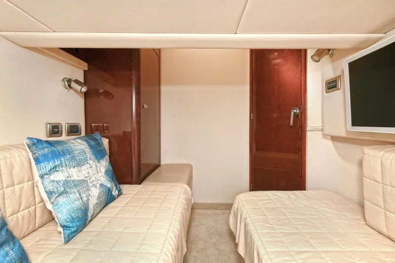 Slide: The Image of Interior of 2008 Sea Ray 44 Sedan Bridge with twin beds. - 42