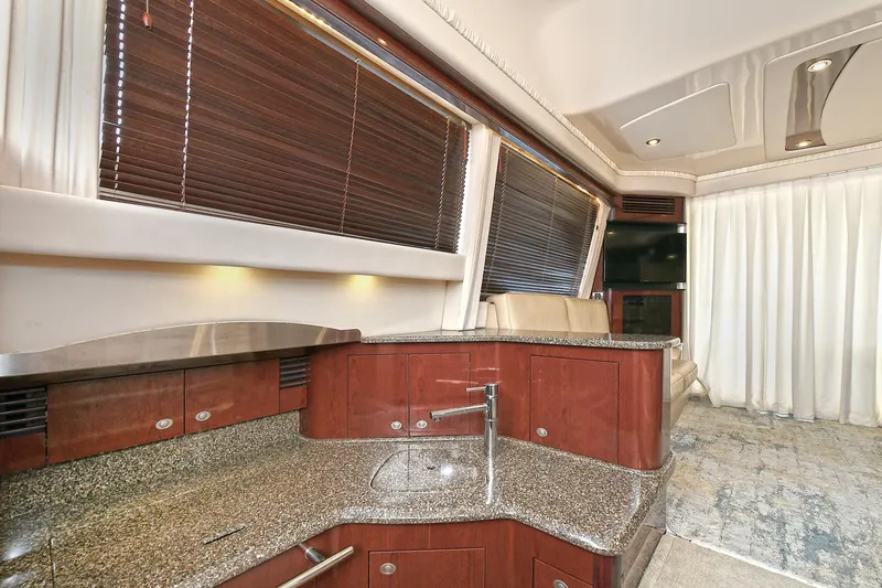 Slide: The Image of Interior of 2008 Sea Ray 44 Sedan Bridge with modern kitchen. - 48