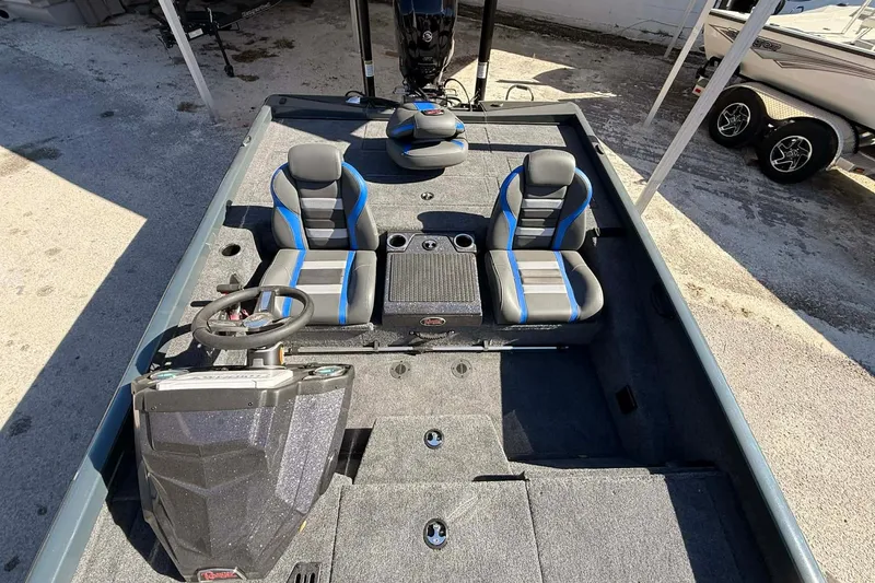 Slide: The Image of 2026 Ranger RT188P boat interior with dual seats and steering console. - 3
