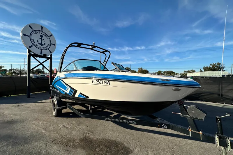 The Image of 2017 Chaparral Vortex 203 VRX boat on trailer, parked outdoors under clear sky. - 0