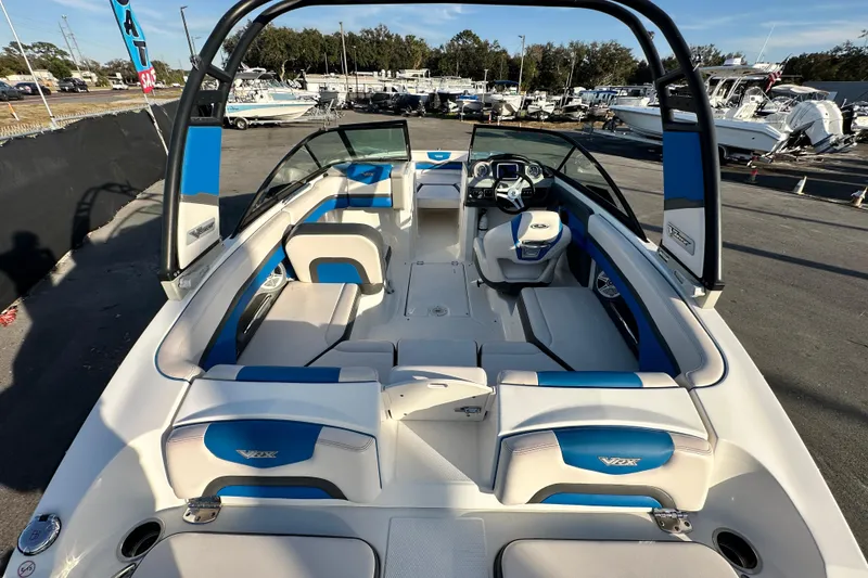 Slide: The Image of 2017 Chaparral Vortex 203 VRX boat interior with blue and white seating. - 12