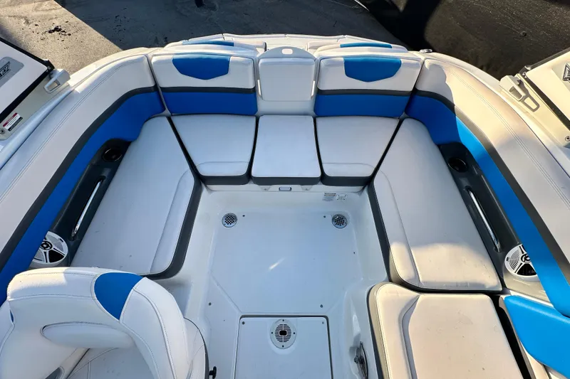 Slide: The Image of 2017 Chaparral Vortex 203 VRX boat interior with blue and white seating. - 28