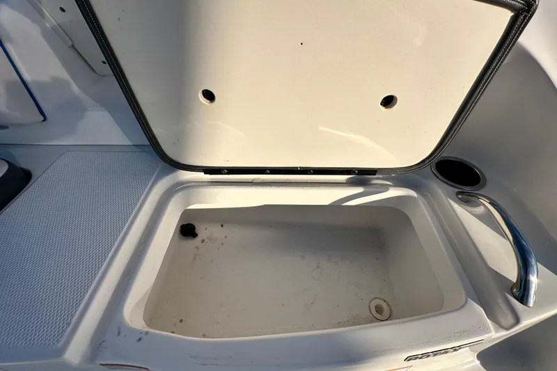 Slide: The Image of Open storage compartment on 2017 Chaparral Vortex 203 VRX boat. - 33