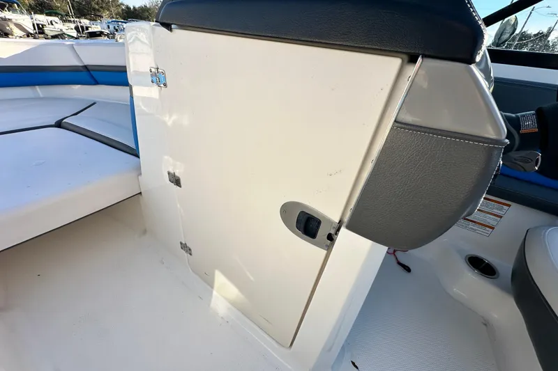 Slide: The Image of 2017 Chaparral Vortex 203 VRX interior seating and storage compartment. - 64