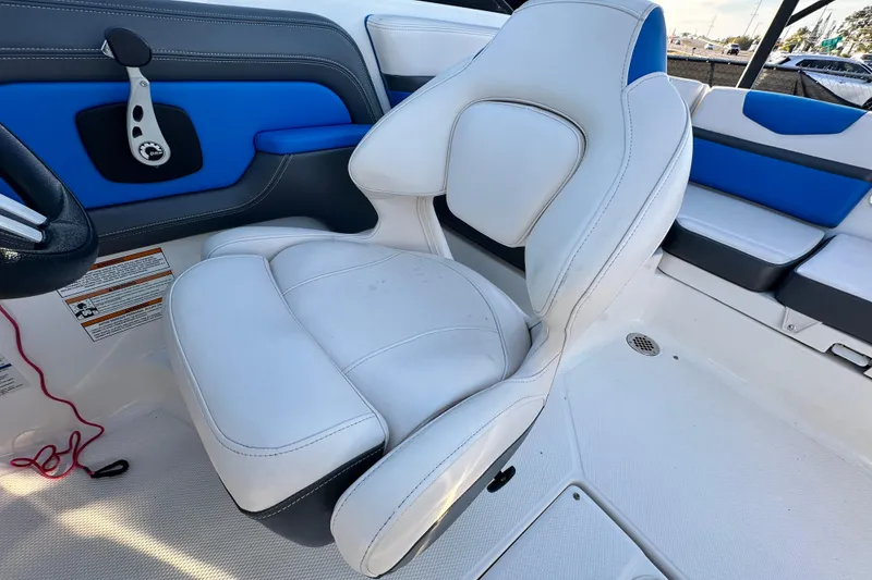 Slide: The Image of 2017 Chaparral Vortex 203 VRX boat interior with white and blue seating. - 86