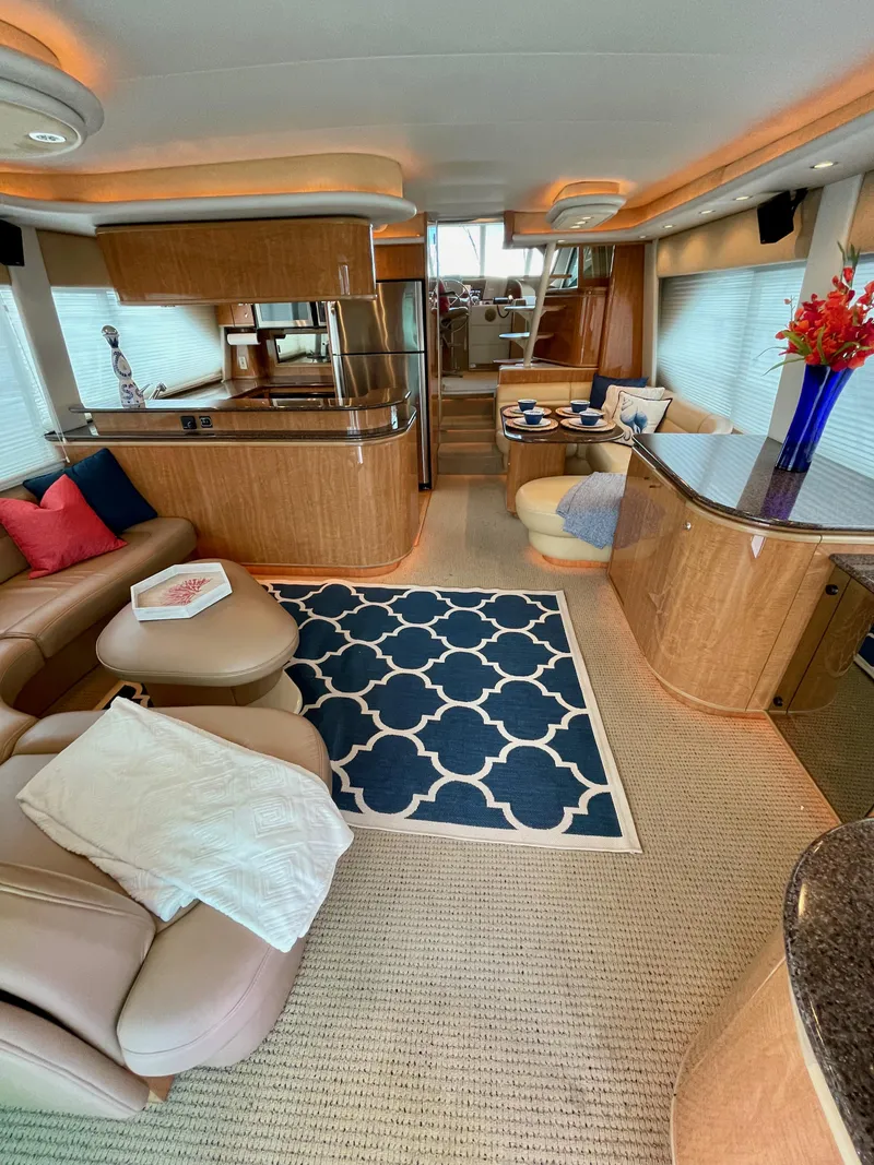 Slide: The Image of Luxurious interior of a 2002 Bayliner 5788 yacht with modern amenities and elegant decor. - 2