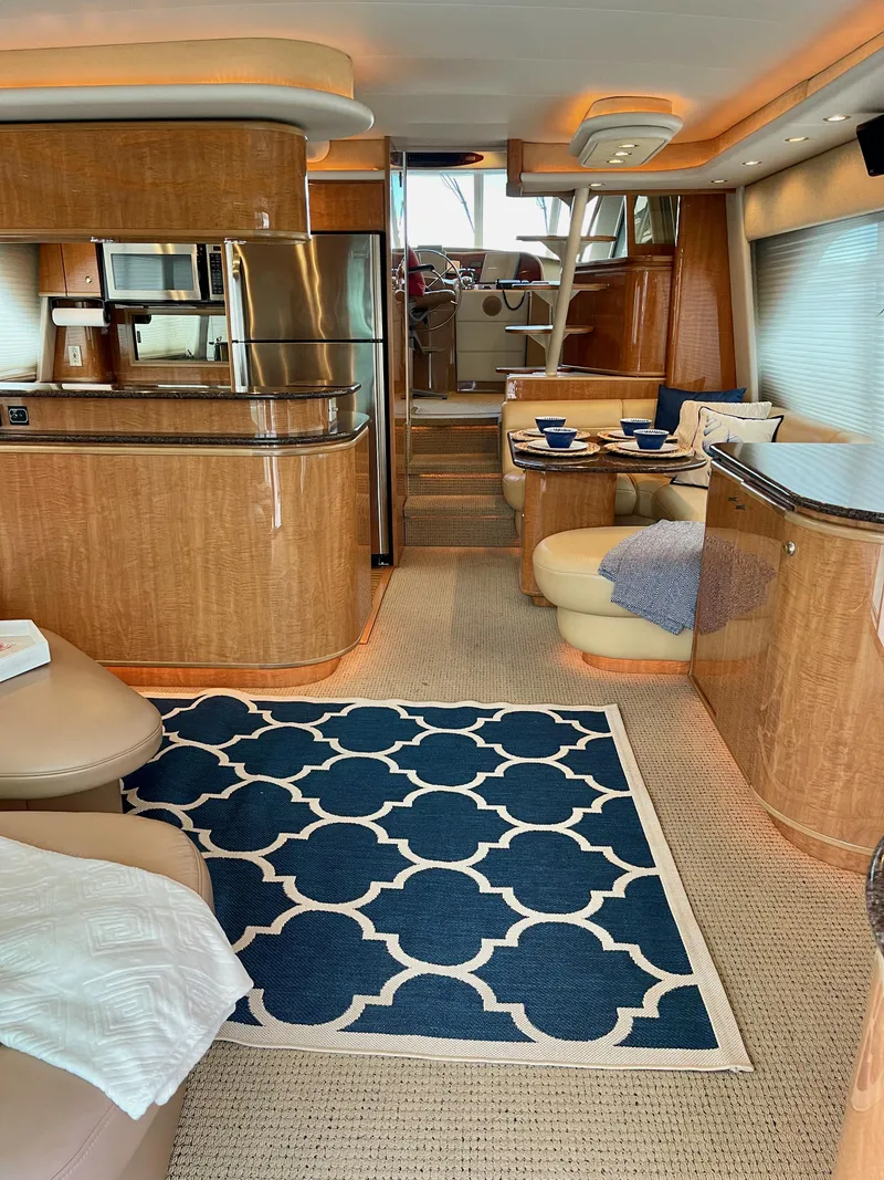 Slide: The Image of Luxurious interior of a 2002 Bayliner 5788 yacht with modern amenities. - 3