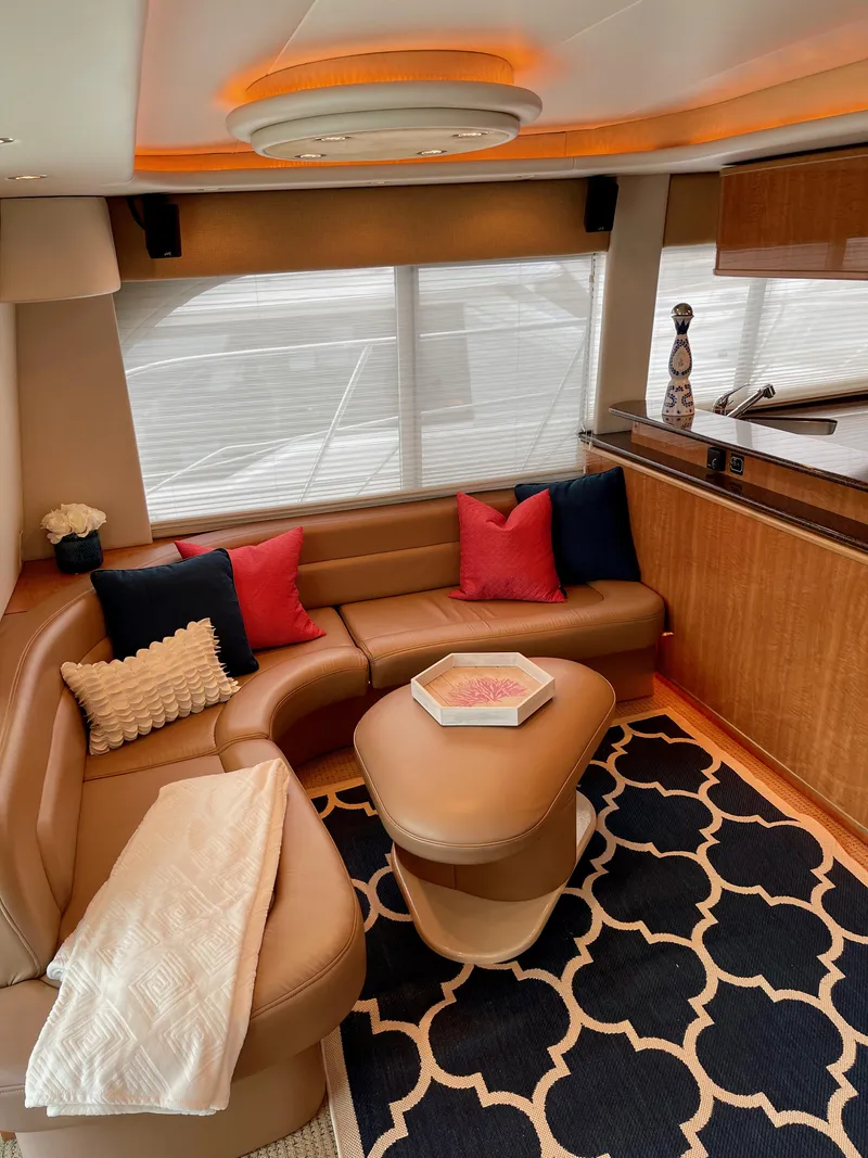 Slide: The Image of Luxurious interior of 2002 Bayliner 5788 yacht with modern decor and comfortable seating. - 8