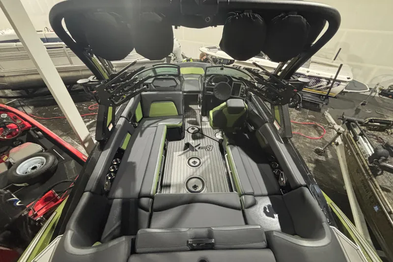 Slide: The Image of 2022 MasterCraft XStar interior with sleek seating and advanced audio system. - 10