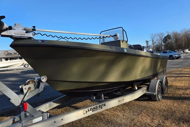 Slide: The Image of 2014 May-Craft 2000CC boat on Load Rite trailer, parked outdoors. - 5