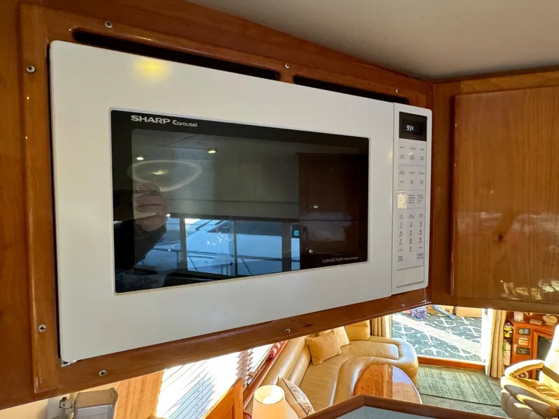 Slide: The Image of Sharp Carousel microwave in 2002 Navigator 5700 Rival yacht kitchen. - 45