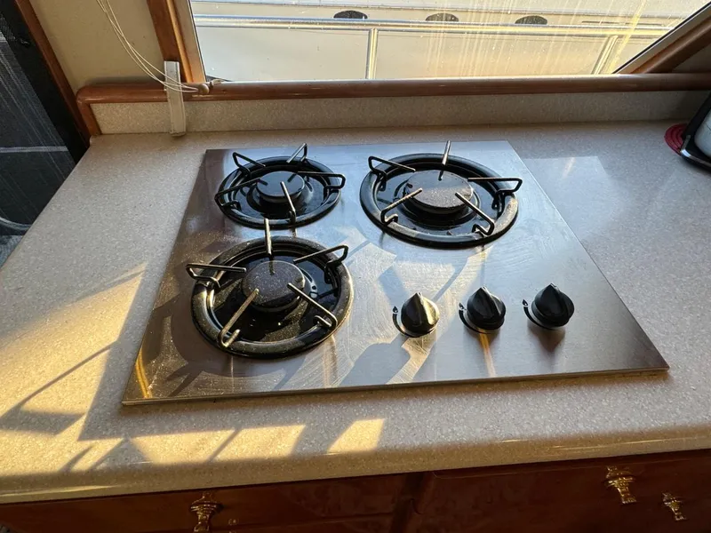 Slide: The Image of Stainless steel three-burner stove on a Navigator 5700 Rival yacht, 2002 model. - 47