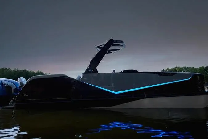 Slide: The Image of Futuristic Custom rOve 225 boat with sleek design and blue LED accents, 2026 model. - 12