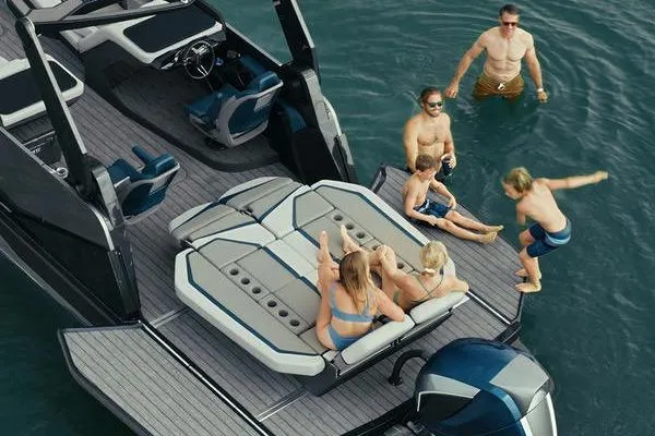 Slide: The Image of People enjoying a day on a 2026 Custom rOve 225 boat in the water. - 20