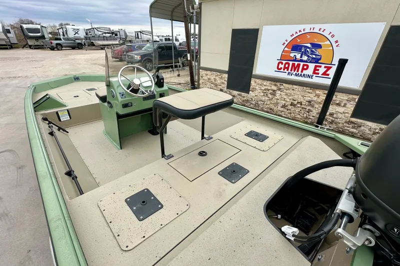 Slide: The Image of 2026 SeaArk Shadow 18 boat at Camp EZ RV-Marine dealership. - 11